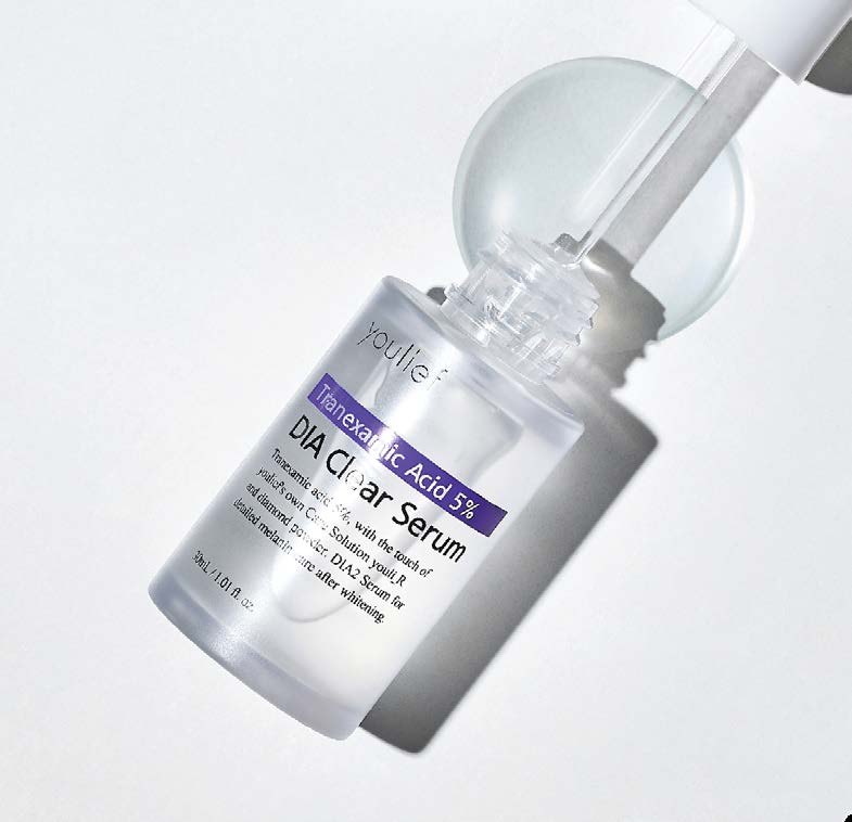 Youlief DIA Clear Serum bottle with dropper, macro still life